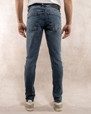 Jean elástico para hombre color azul Sky desgastado marca DANTE regular fit foto atras