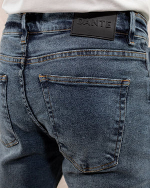 Jean elástico para hombre color azul Sky desgastado marca DANTE regular fit foto cola