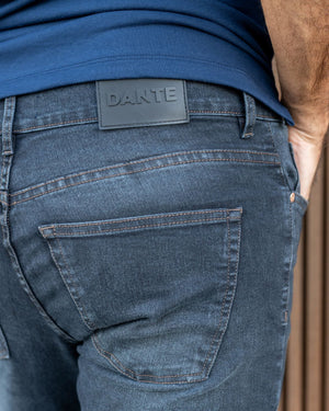 Jean elastico para hombre color azul dirty desgastado marca DANTE regular fit foto cola