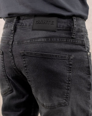 Jean elastico para hombre color negro phantom marca DANTE regular fit foto cola