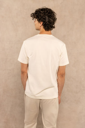 Camiseta antimanchas ivory para hombre marca DANTE regular fit foto detalle logo