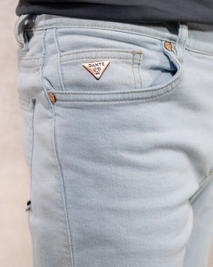 Jean elastico para hombre color azul ice desgastado marca DANTE regular fit foto logo